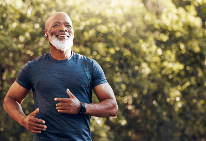 Man running outside listening to music. 